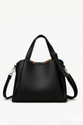 Schwarze Handtasche mit abnehmbarem Riemen